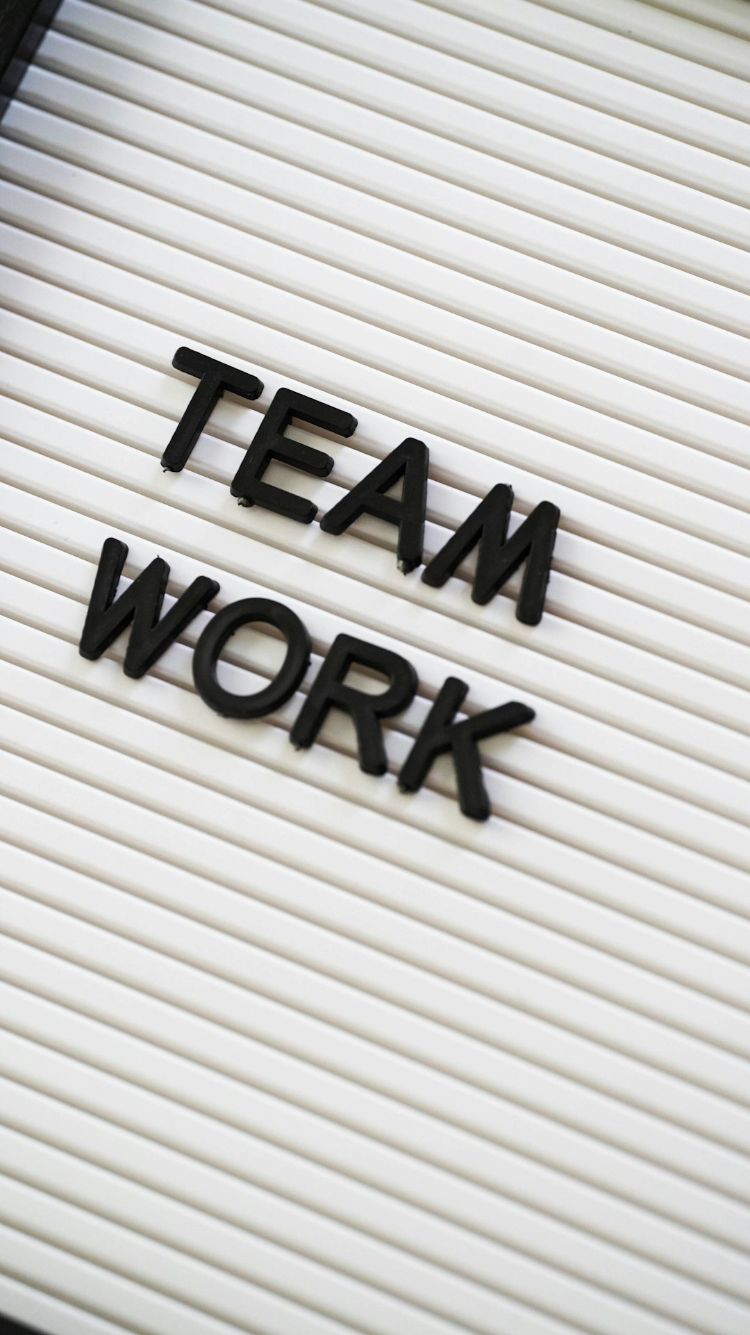 a-sign-that-says-team-work-on-it-pmu3qmn1bpo